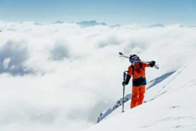FP Events | Switzerland Tourism/Silvano Zeiter, skier on snowy summit