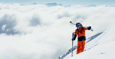 FP Events | Switzerland Tourism/Silvano Zeiter, skieur sur sommet enneigé